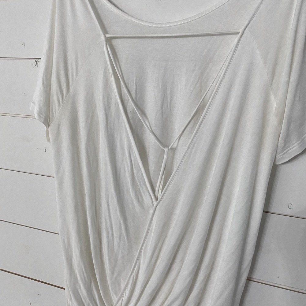 Wide neck white shirt with semi open back